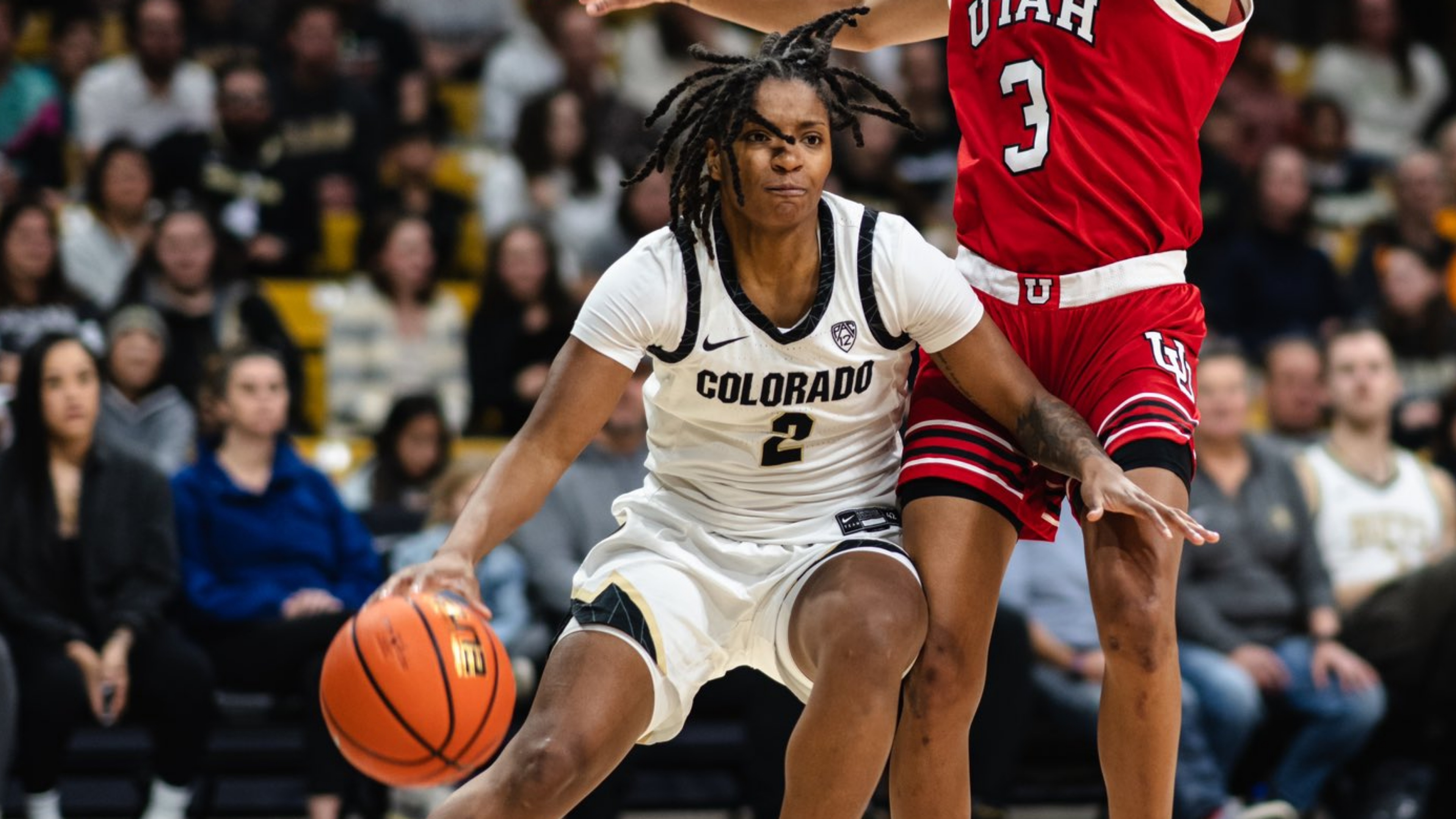 Tameiya Sadler drives vs. Utah at CU Event Center